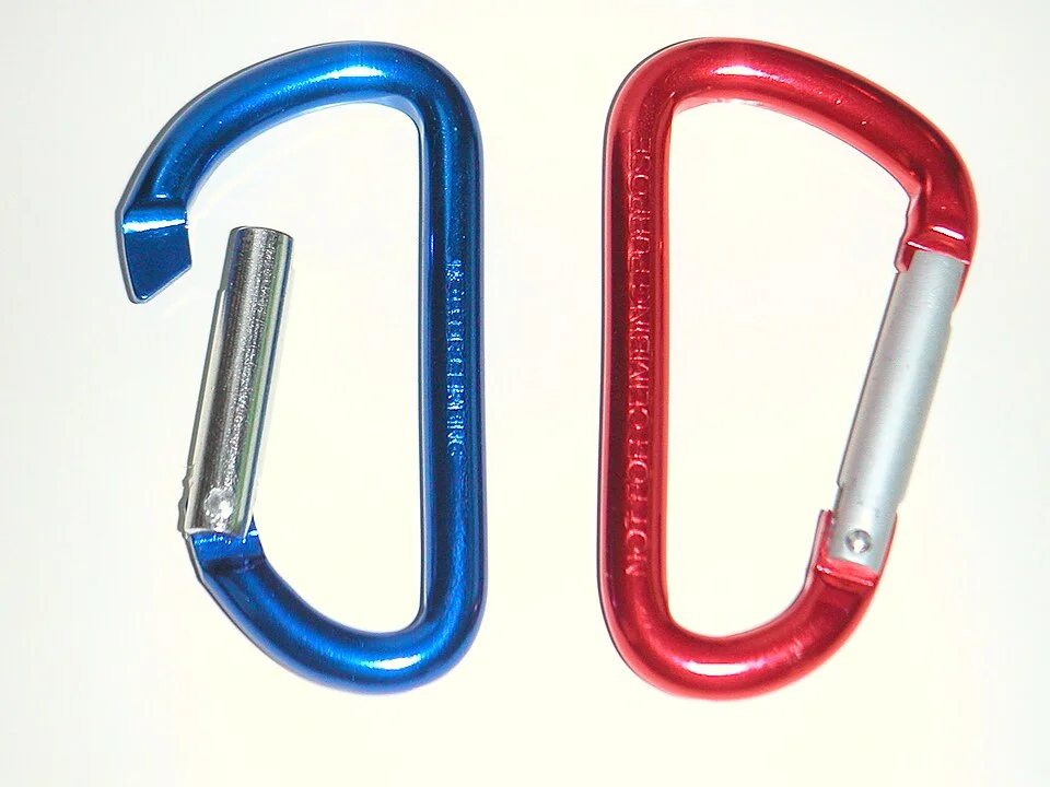 Two metal clips, one with its spring-loaded gate open.